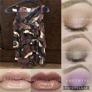 Cute cute ruffle front blouse.